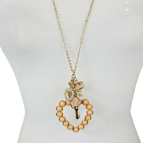 Statement Heart Necklace Romantic Style Gold Tone Bow Bead Charms Acrylic Long - Picture 1 of 9